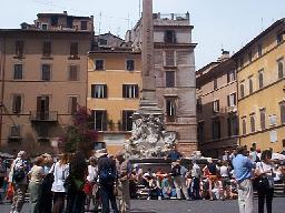 Leaving the Pantheon. Chris is casually leaning against the base of the fountain (blue shirt). I don't think he knew I was taking a picture, he just likes posing in general.