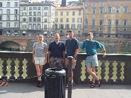 Tamara, Randy, Chris and Forrest in front of the Arno (the Uffizi is behind me).