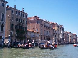 Gondoliers on the main canal of Venice.