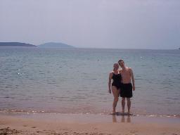 Tamara and Forrest on the beach at Tolo. Chris is a black speck in the water in the middle of the photo.