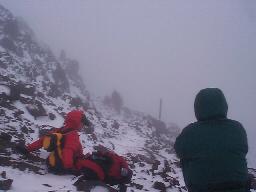 Climbing into the clouds, the snow got deeper.