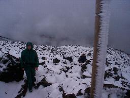 Icy posts marked the trail up the ridge.