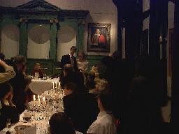 A very grainy shot of the cake being cut.  My camera was unhappy with the light in the Merchant Hall.