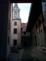 A small courtyard in the harem, the Tower of Justice above.