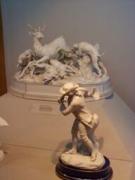 A porcelain hunting scene.