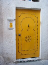 A large door, and a mini-me door for mail.