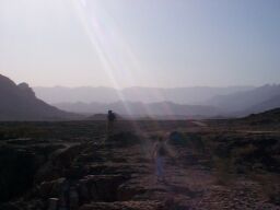 Walking across the broken ground beyond the ravine.