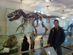 Chris in front of the T-Rex skeleton.