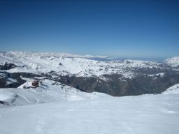 Looking south, downslope to the hotel and across the mountains.