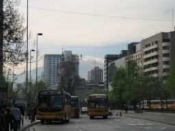 In the midst of downtown, looking up at 19th century churches and the Andes.